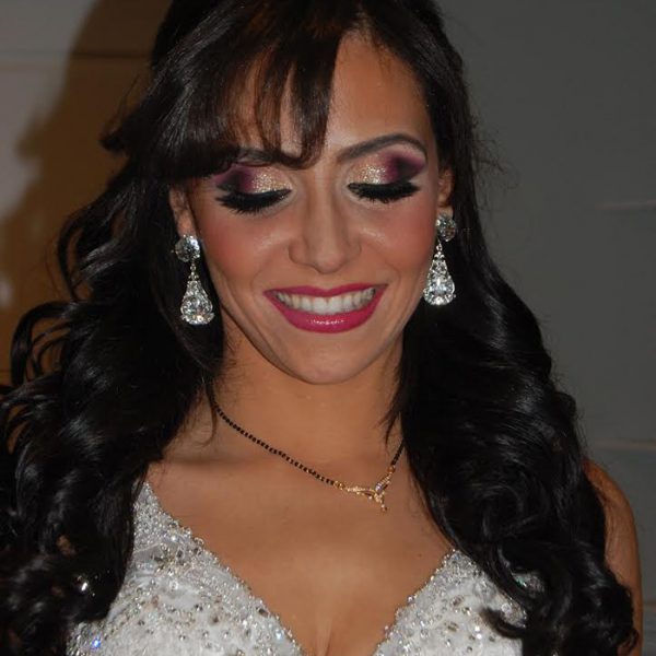 An extra dazzle on the eyes for this bride's reception look - bridal hair and makeup by Naz Beauty